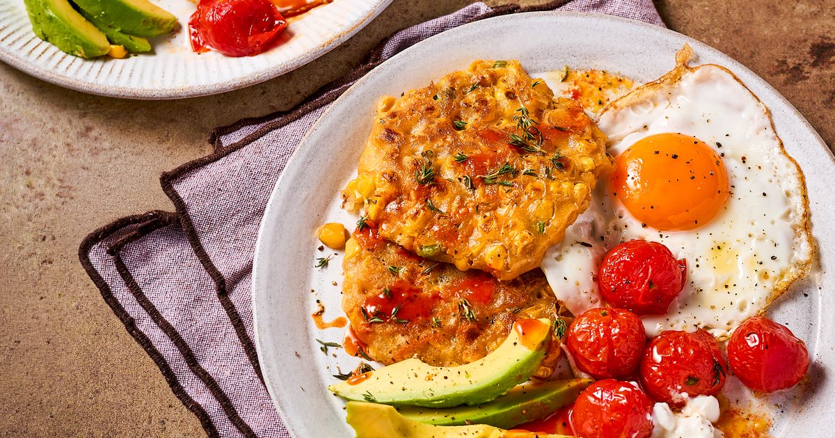 Corn cakes, avocado, eggs & jammy tomatoes recipe