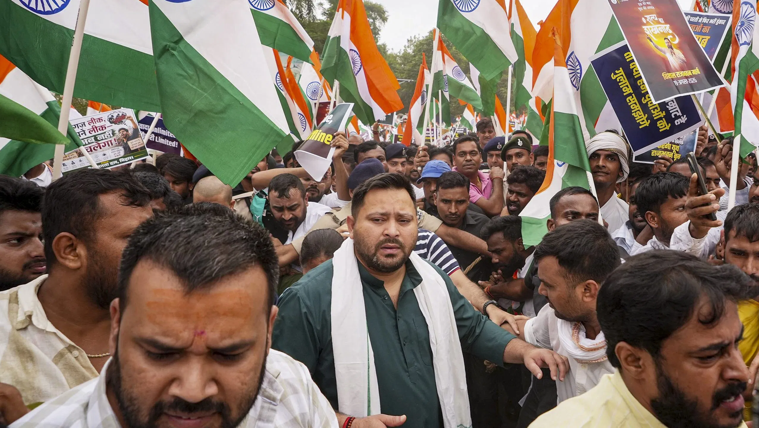 Patna police detain Tejashwi Yadav, RJD workers during Lok Bhavan protest march