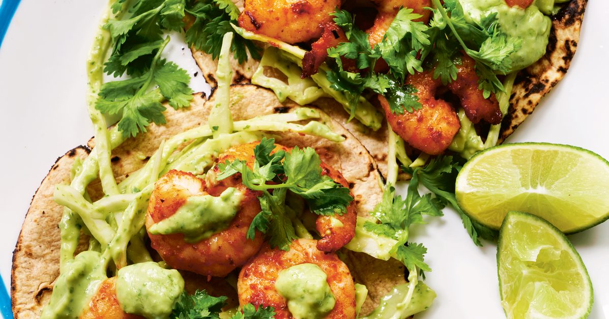 Spiced prawn tacos with avocado lime crema recipe